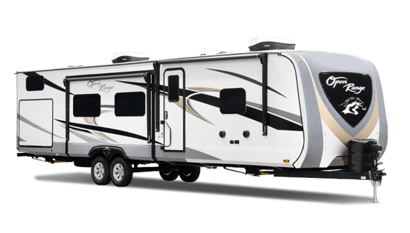 A stylish Open Range travel trailer with a sleek design and dual axles, featuring large windows and a modern exterior. Perfect for camping adventures.